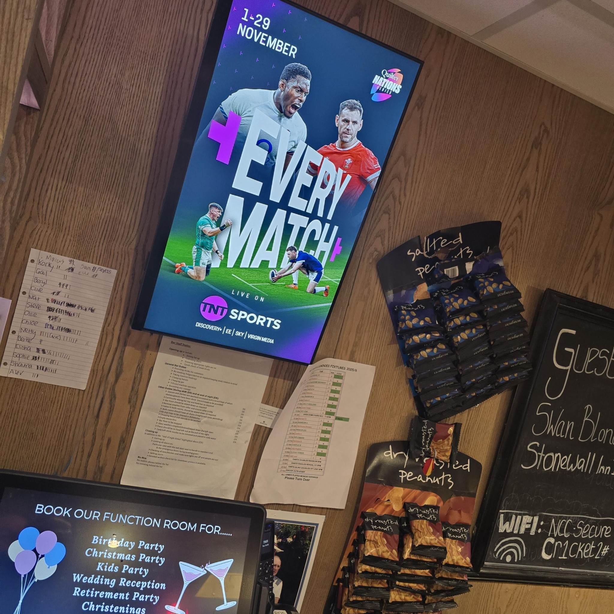 TNT Sports rugby campaign on a portrait Grassroot Media screen beside the clubhouse bar and fixtures board.