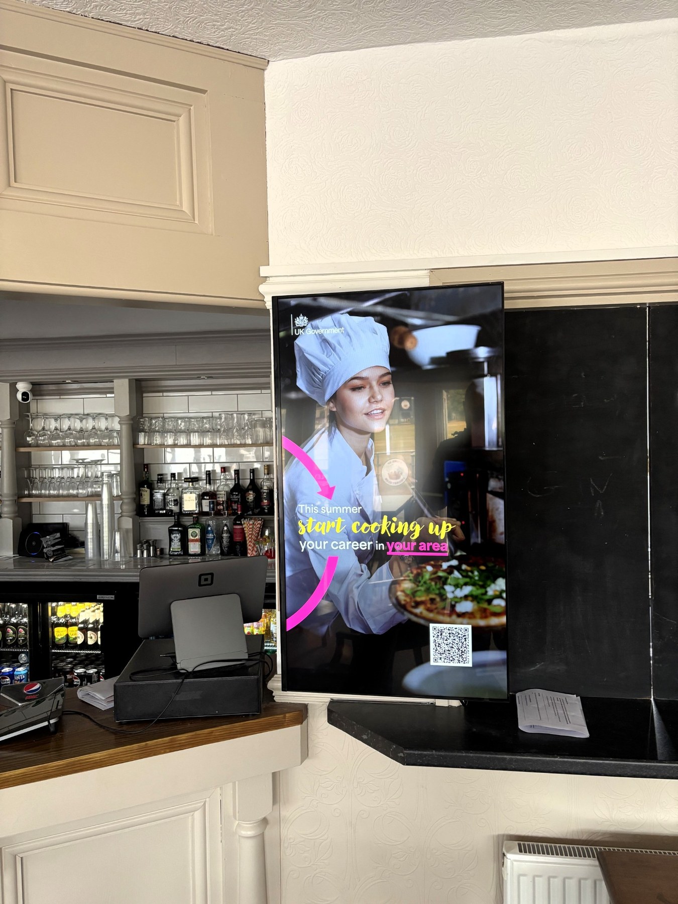 UK Government careers campaign displayed on a Grassroot Media screen inside a clubhouse.