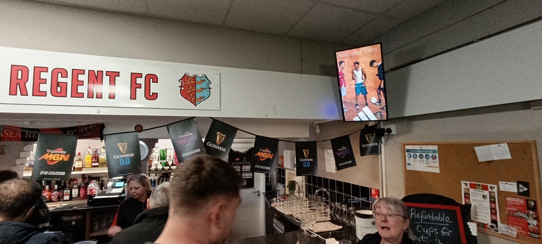 Adidas campaign displayed on a Grassroot Media screen inside a football clubhouse.