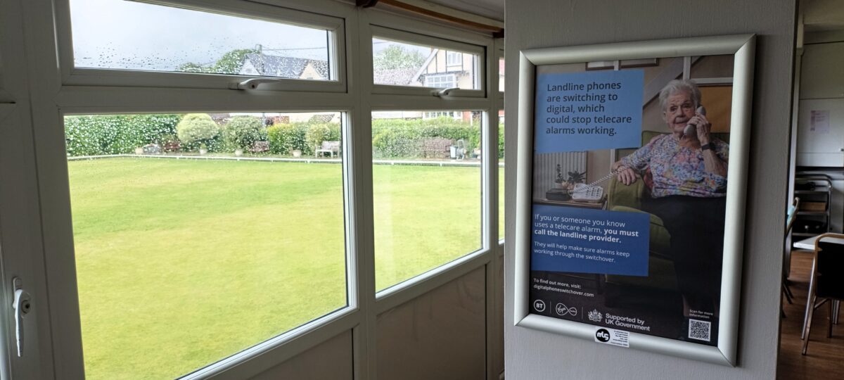 an advertising poster in a grassroot bowls club for the government's analogue switch off