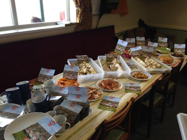 Yorkshire Tea promotional leaflets displayed among cakes and refreshments at Apperley Cricket Club.