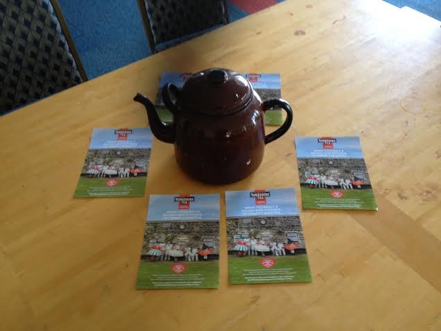 Yorkshire Tea promotional leaflets arranged around a teapot on a table at Worthing Cricket Club.