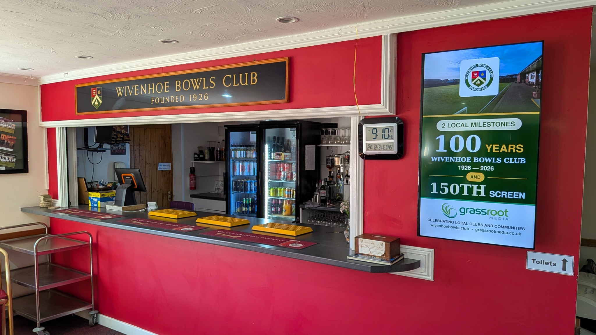 Grassroot Media digital screen at Wivenhoe Bowls Club celebrating the club centenary and the network 150th screen