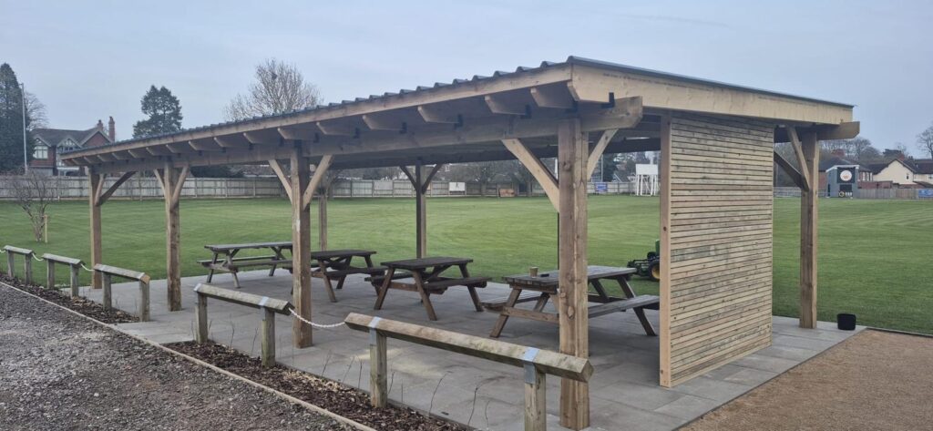 Covered outdoor seating area beside the cricket ground at Stone SP Cricket Club