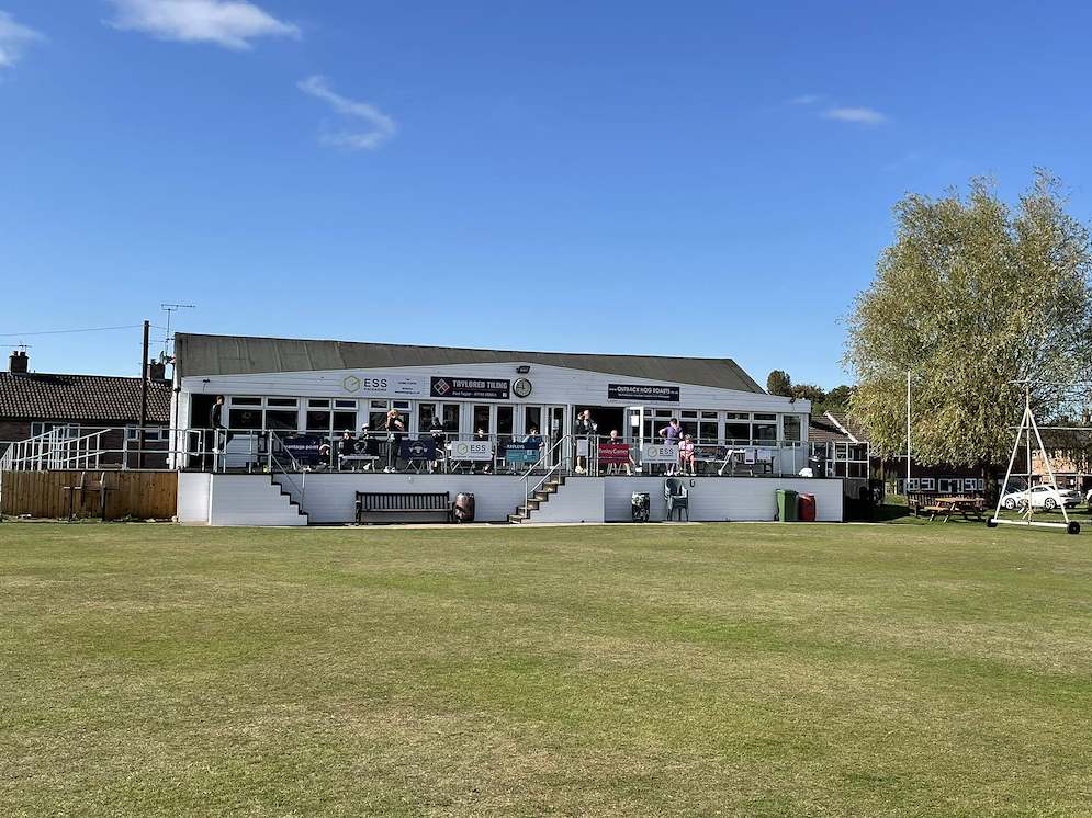 Stone SP Cricket Club pavilion at the Lichfield Road ground viewed across the cricket outfield