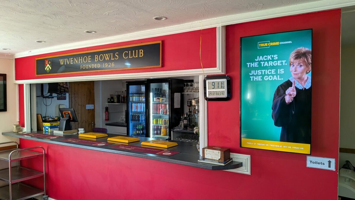 TRUE CRIME Judge Judy digital screen beside the bar at Wivenhoe Bowls Club